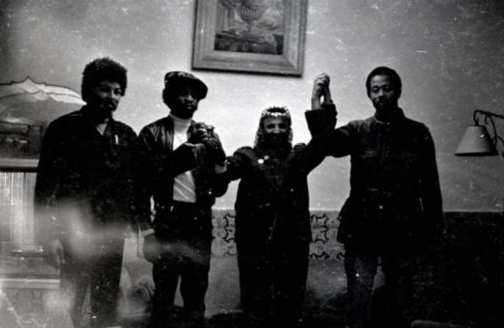 Photo of Donald Cox, Sekou Odinga, Yasser Arafat and Eldridge Cleaver (1970)